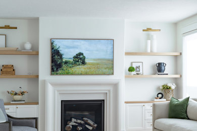 Example of a mid-sized transitional formal and open concept brown floor living room design in Salt Lake City with a standard fireplace, a stone fireplace and a wall-mounted tv