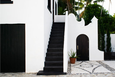 This is an example of a mediterranean white exterior in Miami.