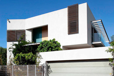 Inspiration for a contemporary two-story exterior home remodel in Tel Aviv
