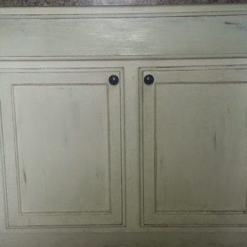 Painted distressed kitchen cabinets