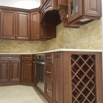 Custom kitchen with lattice wine rack cabinet.