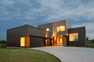 Example of a minimalist exterior home design in Other