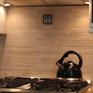 Travertine Mosaic Tile with Varying Heights on Backsplash