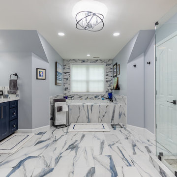 Bathroom remodeling in Columbia, MD with double vanity & marble bathtub