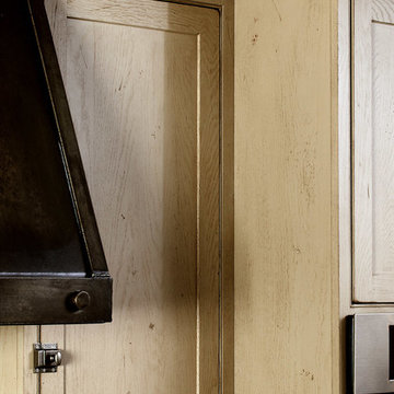 Door style: Pendleton Inset | Species: Red Oak | Finish: Vintage Sandstone