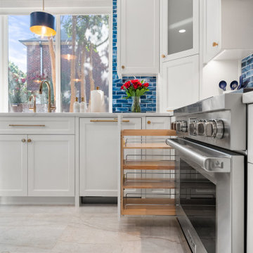 Pull-Out Spice Rack Cabinet Beside Stainless Steel Range