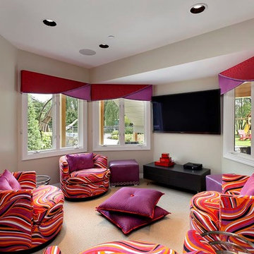 Bright and Colorful Teen Room with Tub Chairs, Floor Pillows and Wall-Mounted TV
