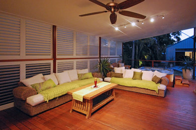 Patio - mid-sized traditional backyard patio idea in Indianapolis with decking and a roof extension