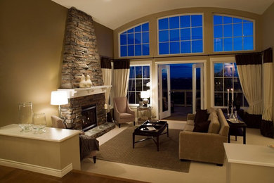 Living room - mid-sized contemporary formal and open concept carpeted and beige floor living room idea in Los Angeles with beige walls, a standard fireplace, a stone fireplace and no tv