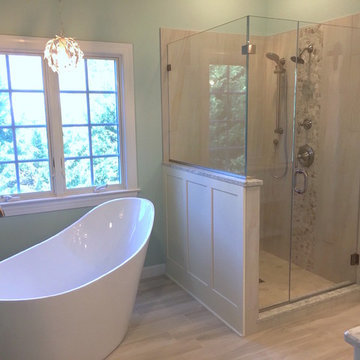 Master bathroom w stand-alone tub & sliding door