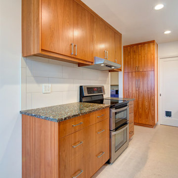 Recycled Glass Countertop and Custom Cherry Cabinets