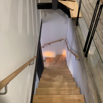 Deux escalier quart tournant l'un sur l'autre dans une trémie rectangulaire