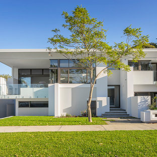 This is an example of a modern two-storey white house exterior in Perth with a flat roof.