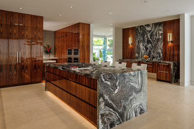 Example of an island style kitchen design in Hawaii
