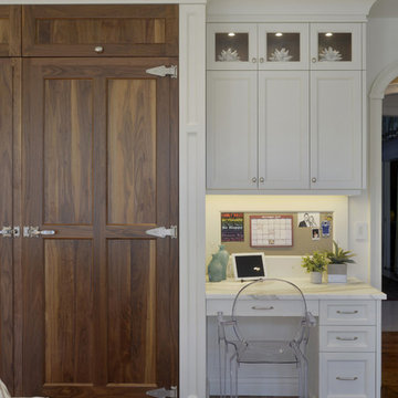 A Dramatic Marble Backsplash in a Transitional Kitchen