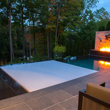 Automatic swimming pool covers installed in Canada
