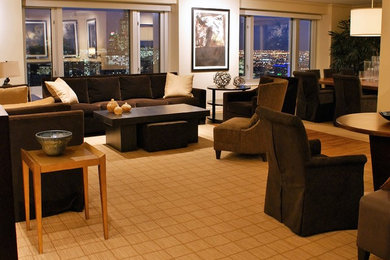 Living room - large contemporary enclosed medium tone wood floor living room idea in Chicago with beige walls and no fireplace