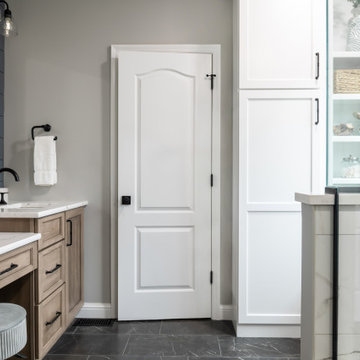A curated bathroom with clever storage and intricate, artful design