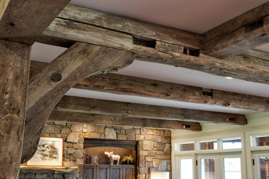 Inspiration for a rustic exposed beam basement remodel in Minneapolis
