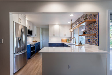 Example of a transitional kitchen design in Seattle
