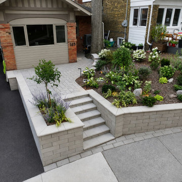 Front Entrance Transformation with Retaining Walls & Lighting