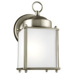 Generation Lighting Collection - New Castle 1-Light Outdoor Wall Lantern, Antique Brushed Nickel - The Sea Gull Lighting New Castle one light outdoor wall fixture in antique brushed nickel creates a warm and inviting welcome presentation for your home's exterior. The petite proportions and transitional accents of the New Castle outdoor lighting collection by Sea Gull Lighting make these one-light outdoor wall lanterns a versatile selection for your home. Offered in White, Polished Brass, Antique Brushed Nickel, Antique Bronze and Black finishes, in either Satin Etched or Clear glass. Clear bulbs are recommended to use for the best aesthetics for the Clear glass fixtures. Both incandescent lamping and ENERGY STAR-qualified LED lamping options are available for those fixtures with the Satin Etched glass. And the Clear glass fixtures can easily convert to LED by purchasing LED replacement lamps sold separately.
