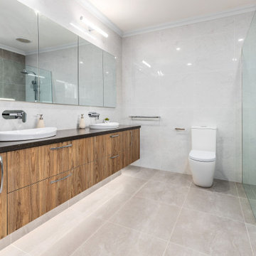 Spectacular Blend of Warmth in this Modern Main Bathroom Renovation