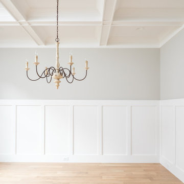 Dining Room with Board-and-Batten Wainscot and Coffered Ceiling