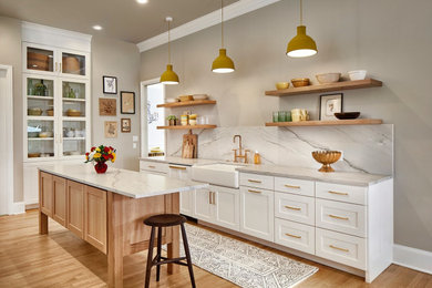 Cottage light wood floor kitchen photo in Dallas with a farmhouse sink and an island