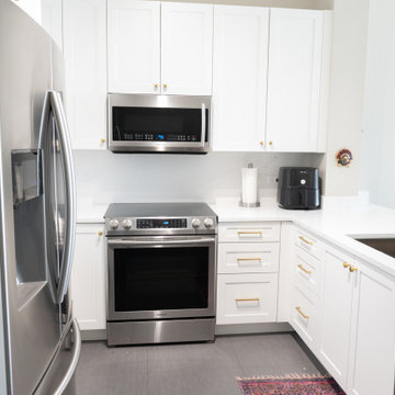 Contemporary Kitchen Remodel Done in a Painted White Shaker Door