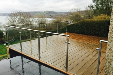 Design ideas for a small contemporary back patio in Other with decking and no cover.