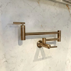 A Luxurious Open-Concept Kitchen - Pot Fillers