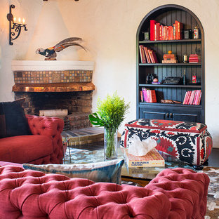Medium sized mediterranean living room in Los Angeles with a corner fireplace and a tiled fireplace surround.