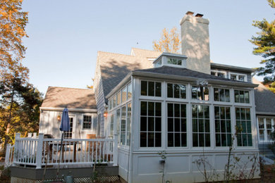 Mid-sized elegant gray two-story vinyl gable roof photo in Philadelphia