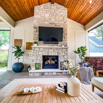 Pool-Side Covered Patio with a Fireplace and Outdoor Kitchen