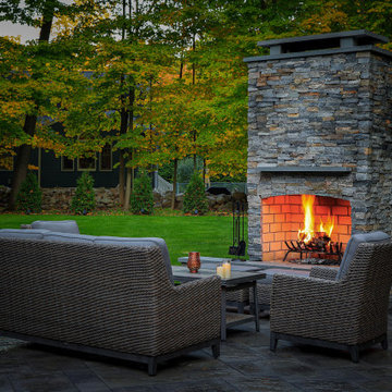 Make a Statement with a Versatile Outdoor Kitchen and Double Fire Feature