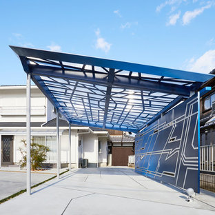 他の地域のコンテンポラリースタイルのおしゃれな前庭 (私道、半日向、コンクリート敷き	) の写真