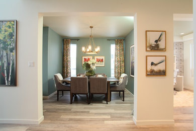Example of a minimalist dining room design in Calgary