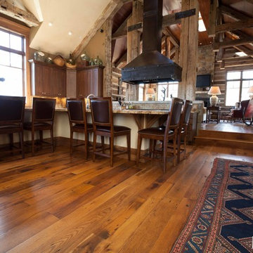 Hand Hewn Hammer Beams and Slab Siding with Oak Flooring