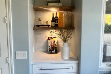 Inspiration for a contemporary home bar remodel in San Diego