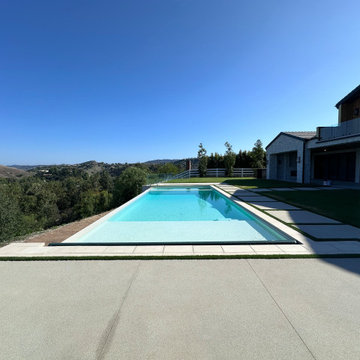 Jim Bredger Infinity edge pool and spa with atomatic cover