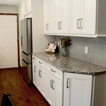 Cream Kitchen with Green Island with Butcher Block Countertop