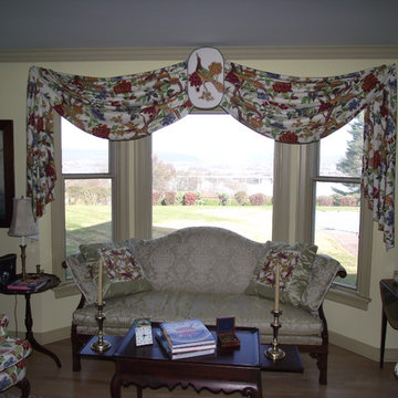 Living room, Drapes,Pillows and Chairs pulling existing furniture together