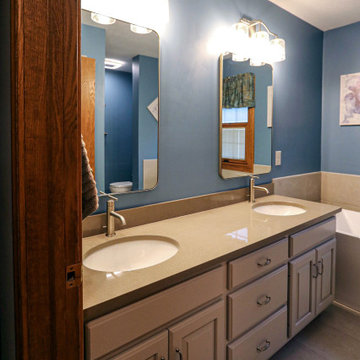 Updated Master Bath with Quartz Countertops, Freestanding Tub & Tiled Shower