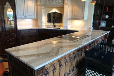 Inspiration for an eclectic eat-in kitchen remodel in Atlanta with quartz countertops