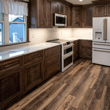 New Cambria Queensbury Countertops, Gloss Tile Backsplash and LVT Flooring