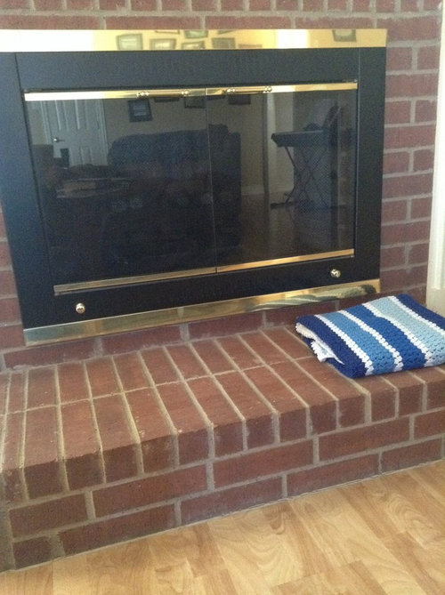 Install a wood burning insert in fireplace.