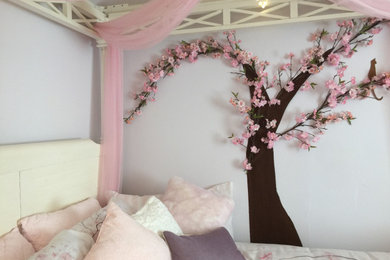 Kids' room - small transitional boy carpeted and beige floor kids' room idea in DC Metro with blue walls
