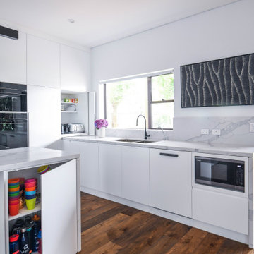 White Kitchen with Island Storage