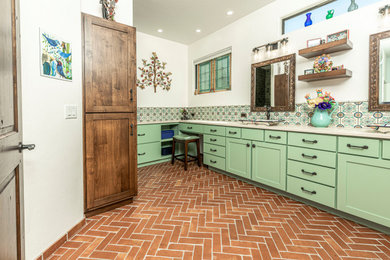 Example of a southwest home design design in Phoenix